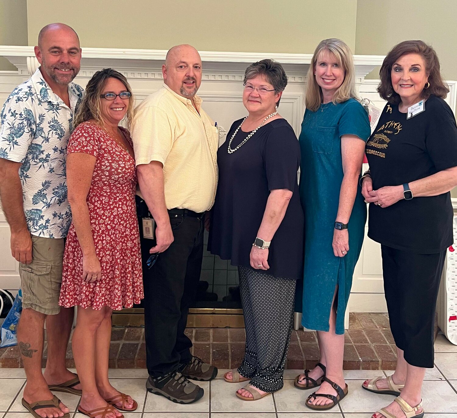 Pictured from left are hostesses and guest Matt Kostos, Amy Kostos, Wes Holsapple, Jr., Sherrie Holsapple, Wendy Greif, and Janie Walters.